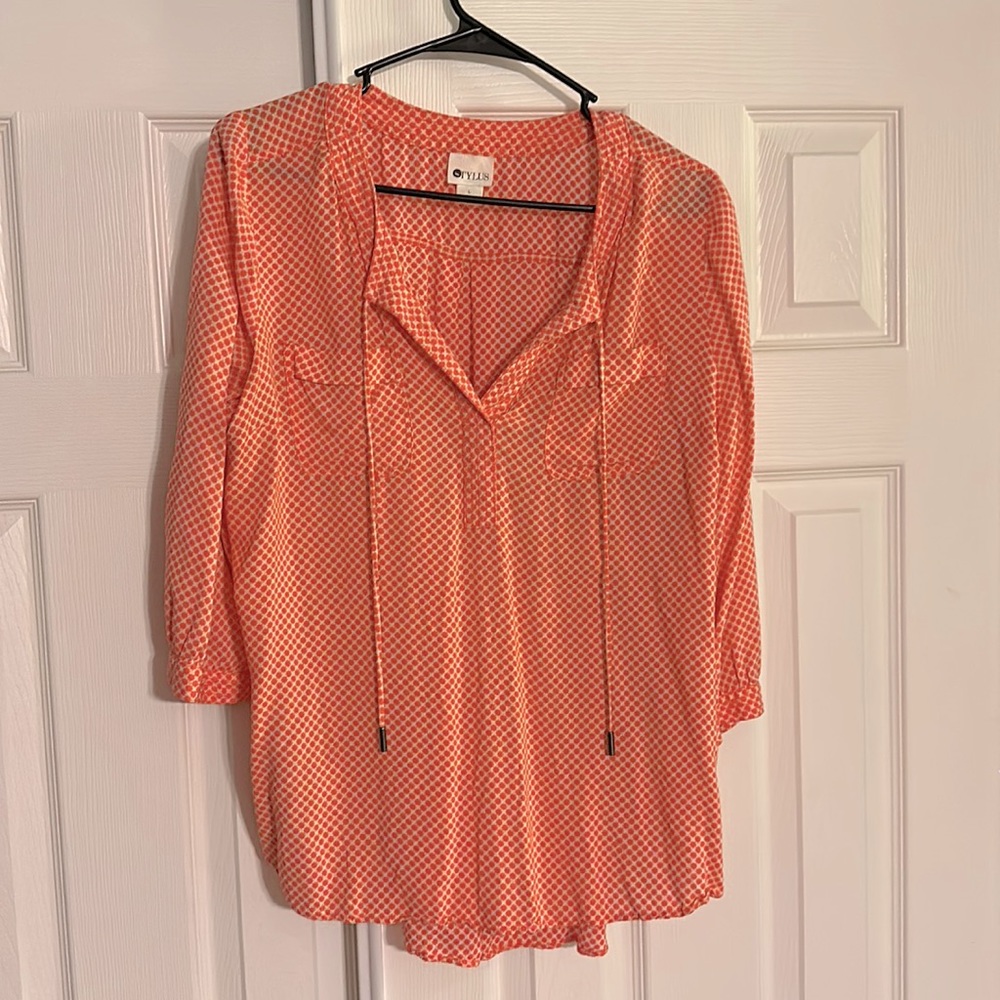 Orange and cream polka dotted business casual shirt